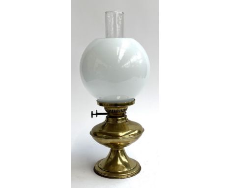 A brass oil lamp with chimney and milk glass shade, 43cmH 