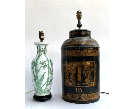 Two table lamps, one ceramic with bamboo design, the other painted tin, 52cmH 