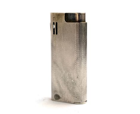 An engine turned white metal lighter by Savinelli, 6.8cmH 