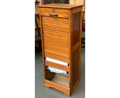 A Victorian light oak tambour fronted filing cabinet, with slides, on bracket feet, (tambour present but in need of repair) 4