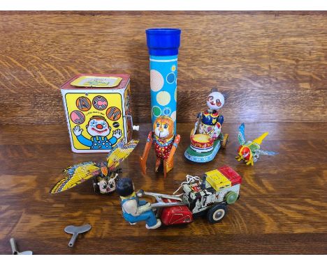 Tin plate toys, Jack in Box and a Chad Valley kaleidoscope.