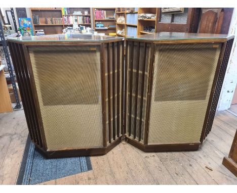 A pair of large Tannoy GRF corner speakers finished in mahogany veneer with bevel glass tops, 45" tall.  Matching cabinet num