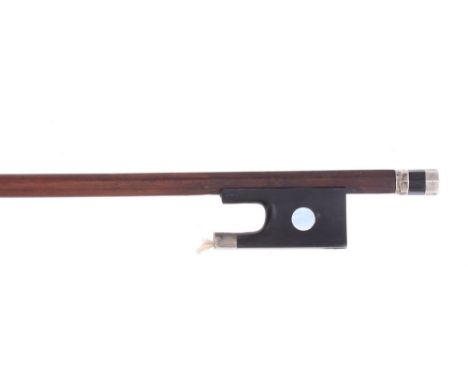 19th century French silver mounted violin bow, the stick round, the ebony frog inlaid with large pearl eyes and the ebony adj