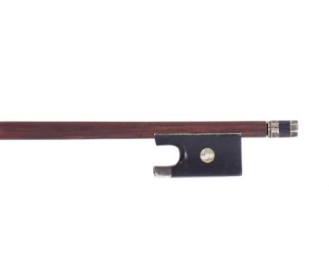 Silver and nickel mounted violin bow circa 1840, faintly stamped, the stick round, the ebony frog inlaid with pearl eyes and 