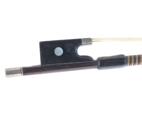 German silver mounted violin bow, indistinctly stamped A. Ce...berg, the stick octagonal, the ebony frog inlaid with pearl ey