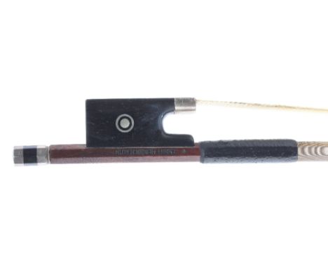 German silver mounted violin bow by and stamped *Ernst Heinrich Roth, the stick octagonal, the ebony frog inlaid with silver 