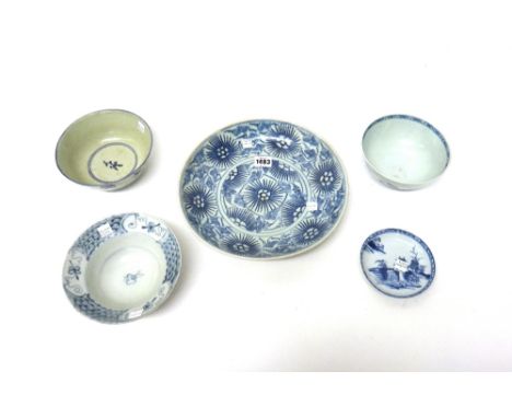 A group of Chinese blue and white shipwreck porcelains, 18th and 19th century, comprising; a `Starburst' pattern dish and a `