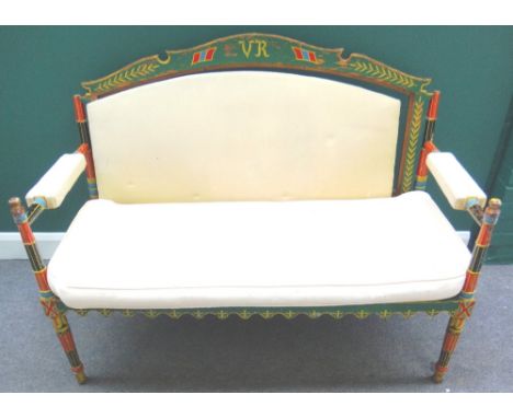 An early 20th century Indian polychrome painted open arm sofa on tapering turned supports, 137cm wide.

Provenance:  by reput