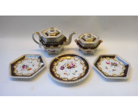 A Ridgway porcelain part tea service, circa 1825-30, painted with flower sprays inside deep cream, blue and gilt borders, com