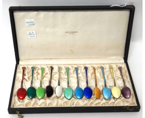 A set of twelve Norwegian silver gilt and vari coloured enamel coffee spoons by David Andersen, Oslo, detailed David Andersen