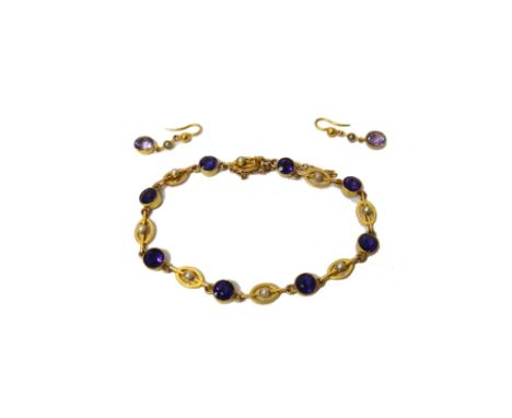 A gold, amethyst and half pearl set bracelet, collet set with a row of circular cut amethysts alternating with half pearl set