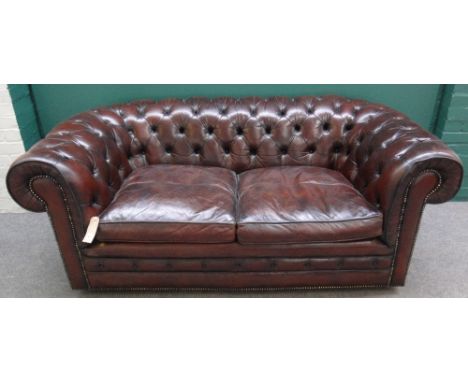 A 20th century brown leather button upholstered Chesterfield sofa, 181cm wide.