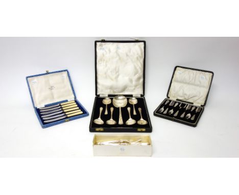 A set of six silver fruit spoons and a larger silver fruit serving spoon, Sheffield 1947, combined weight 262gms, cased, a se