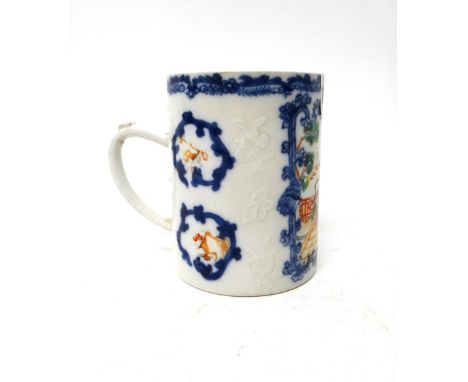 A Chinese export famille-rose cylindrical mug, Qianlong, painted with a figurative panel inside an underglaze blue foliate bo