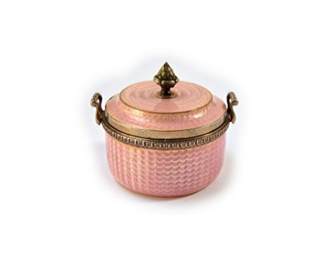 A copy of a Faberge twin handled miniature bowl, with a detachable cover, the exterior with pale pink engine turned enamelled