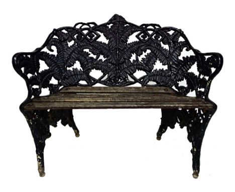A Coalbrookdale design fern and blackberry cast iron black painted two seater garden bench, 113cm wide.  Illustrated
