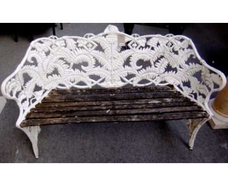 A 20th century Coalbrookdale style white painted garden bench, in the fern and berry pattern, 153cm wide.
