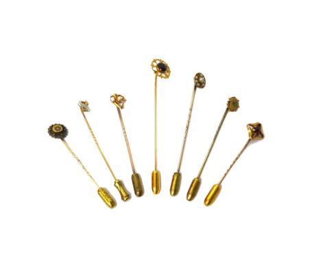 A gold topped and rose diamond set stick pin, detailed 15 CT, a gold topped and seed pearl set stick pin, detailed 9 CT, a 9c