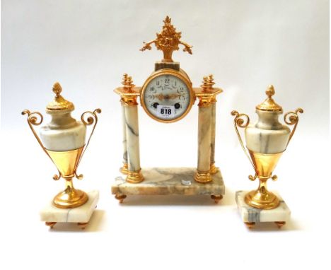 A Continental marble and ormolu mounted clock garniture, late 19th century (re-gilded), the drum supported on four pillars on