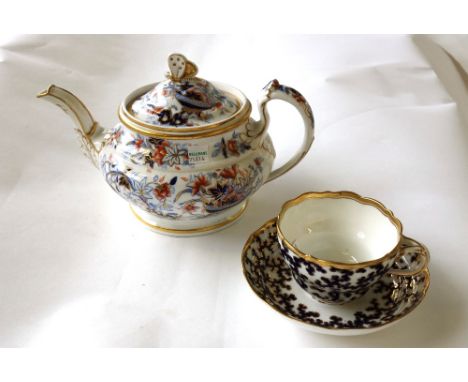 A group of Ridgway porcelain, 19th century, comprising; a teapot and cover, a trio, and matching Worcester plate, each decora