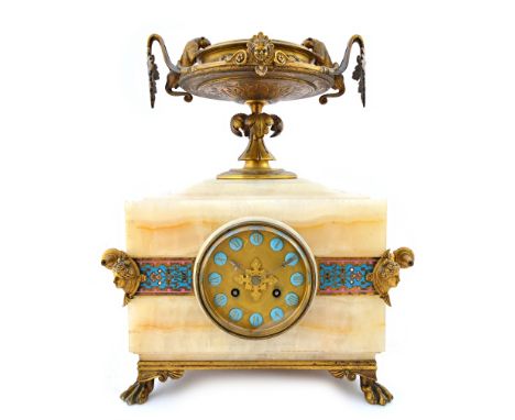 A Napoleon III ormolu and champleve enamel decorated onyx striking mantel clock, circa 1870, the rectangular case surmounted 