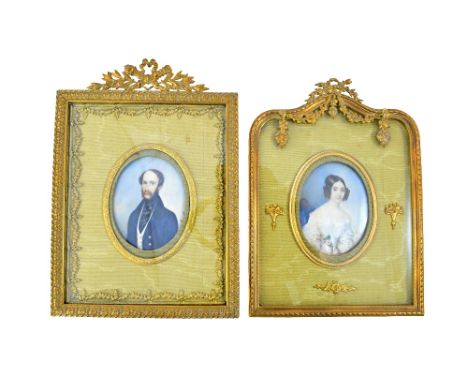 Michele Albanesi (1816-1878) Italian, a pair of portrait miniatures on ivory depicting a husband and wife, each in a water si