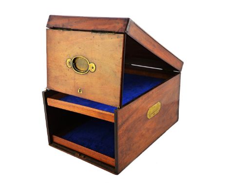 An 18th century Campaign design travelling box, with lift top and front pivoting panel, enclosing two pull-out trays, 30cm wi