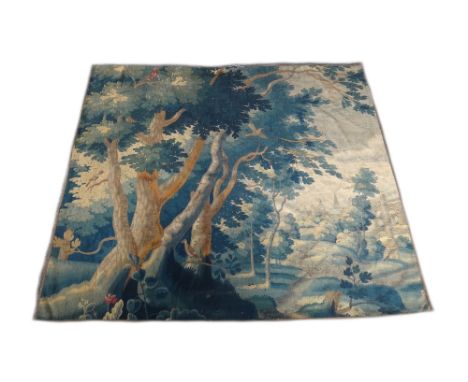 A 17th century verdure Flemish tapestry panel (cut down and re-backed), 239cm x 208cm. Illustrated