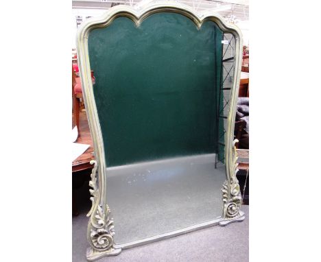 A large 19th century later green painted wall mirror, with shaped arch top and acanthus scroll lower bracket, 143cm wide x 17