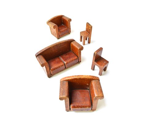 A suite of miniature 1930's style furniture, to include a sofa, 17cm wide, a pair of armchairs and two single chairs. (5)  Il