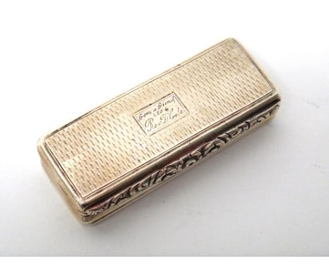 A silver rectangular hinge lidded snuff box, gilt within, the cover and the base engine turned, presentation inscribed Birmin