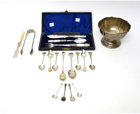 Silver and silver mounted wares, comprising; a bowl of panel shaped form, on a circular foot, a pair of sugar tongs, a christ