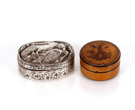 An antique silver and enamel&nbsp;oval snuff box,&nbsp;with bird decoration to the lid 7cm; and an 18th Century snuff box wit