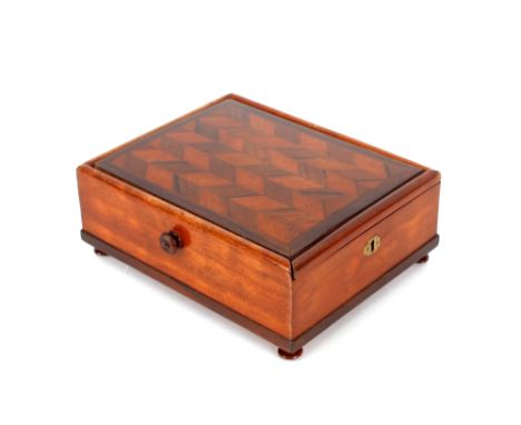 A 19th Century mahogany and rosewood box,&nbsp;having parquetry sliding lid containing various chess pieces