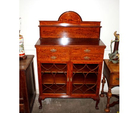 A good quality Edwardian&nbsp;inlaid mahogany side cabinet,&nbsp;having raised shelf back above four short drawers, shelved b