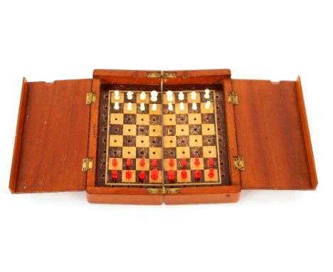 A Jaques mahogany cased travelling chess set