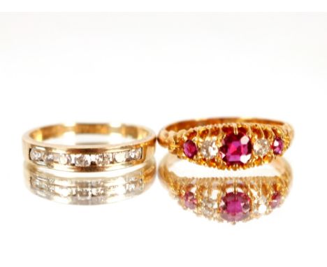 A 9ct gold ring,&nbsp;set with diamond and white stones, 1.2gms, size "K"; and an 18ct gold ring set diamonds and red stones,