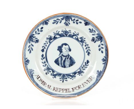 A 18th Century Delftware plate,&nbsp;"Admiral Keppel For Ever", the centre with head and shoulders portrait of the Admiral su