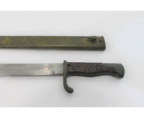 WW1 GERMAN MAUSER BAYONET a 98/05 model German bayonet, with a straight fullered blade, wooden grip and metal mounts. Blade s