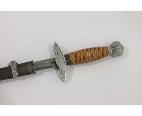 WW2 GERMAN LUFTWAFFE OFFICERS DAGGER with an orange coloured grip and twisted wire, with a silver coloured metal cross guard 