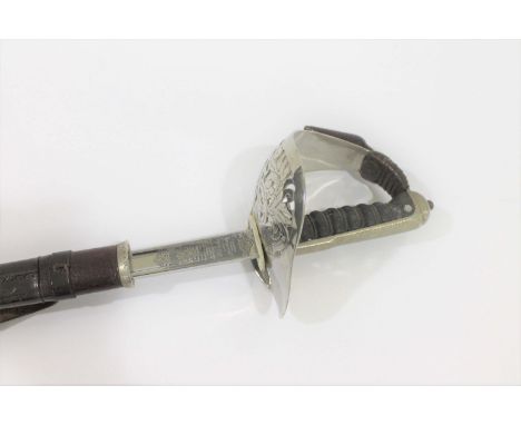 QEII 1897 PATTERN INFANTRY SWORD with a Wilkinson blade, Serial Number ITCRM14, mouth of the scabbard marked RSM13 (Regimenta
