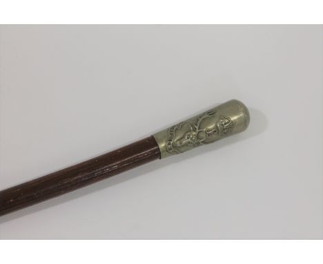 SEAFORTH HIGHLANDERS A swagger stick bearing the Seaforth Highlanders badge of stags head and motto 'Guidich'n Rich' 27" long