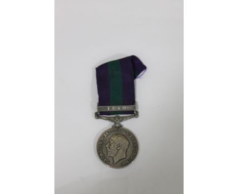 A GENERAL SERVICE MEDAL 1918-62. A George V General Service medal with Iraq clasp, named to 439, Driver Gulam Haliq, S&amp;T.