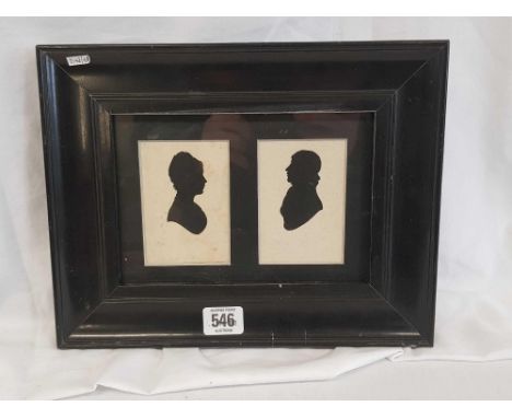 A PAIR OF ANTIQUE SCISSOR CUT PORTRAIT SILHOUETTES OF A LADY AND GENTLEMAN IN ONE FRAME.