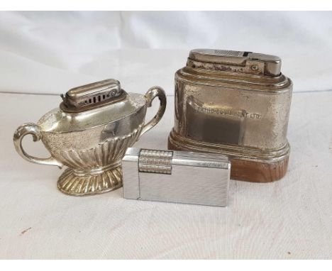 3 CIGARETTE LIGHTERS, 1 ADVERTISING PATHE EQUIPMENT LTD, A COLIBRI OF LONDON GAS LIGHTER &amp; 1 VASE SHAPED MADE IN OCCUPIED