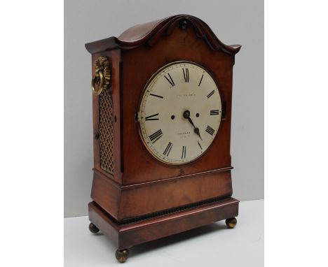 A Regency Mahogany bracket clock, with a domed top and an enamel dial with Roman numerals inscribed "W.M. Malcolm, Inverary",