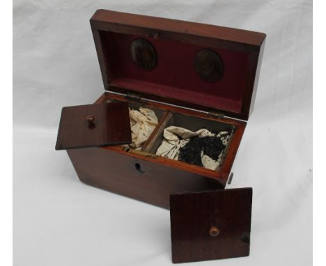 A Victorian mahogany tea caddy of sarcophagus form, with two lidded compartments to the interior on square feet, 20.5cm wide 