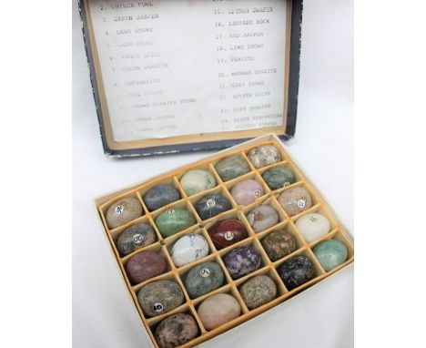 A set of twenty five egg shaped polished stone/mineral samples, including aventurine, green jasper, jade stone, rose quartz, 