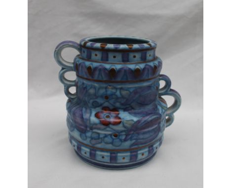 A Crown Ducal, Charlotte Rhead pottery twin handled vase decorated with purple, blue and red flowers to a mottled blue ground