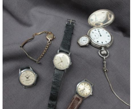 A George VI silver hunter keyless wound pocket watch, the enamel dial with Roman numerals and a seconds subsidiary dial, Birm